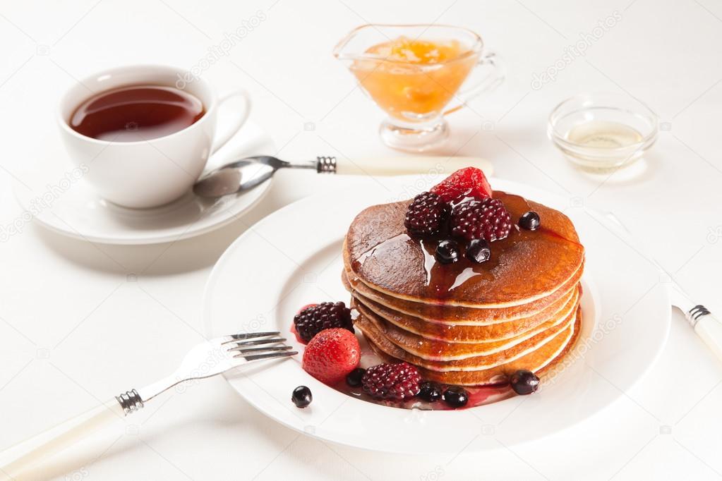 delicious pancakes on breakfast table
