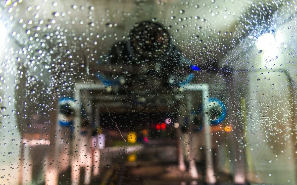 a car Running through automatic car wash.