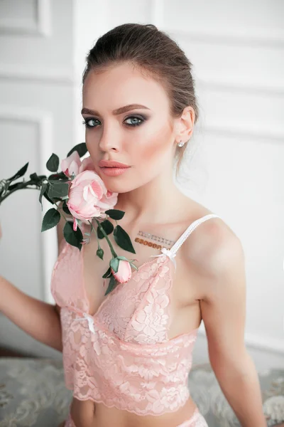 Portrait of a beautiful young girl in underwear — Stock Photo, Image