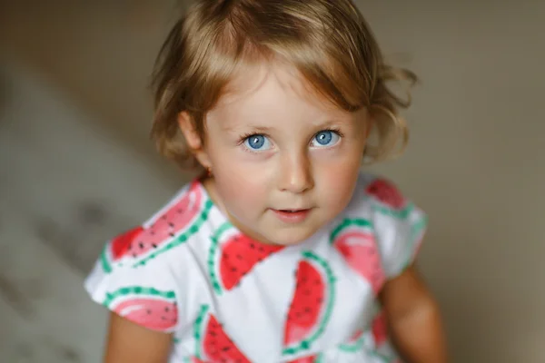 Portrait of a pretty little girl baby blonde with big blue eyes, — Stock Photo, Image