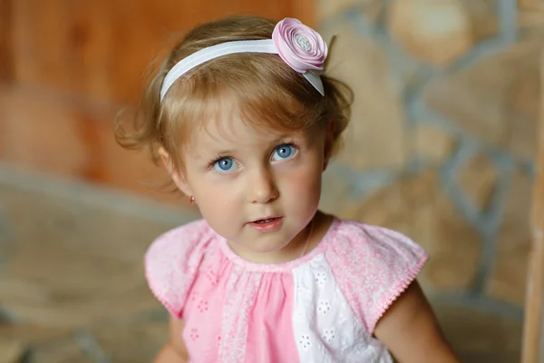 Portrait of a pretty little girl baby blonde with big blue eyes, — Stock Photo, Image