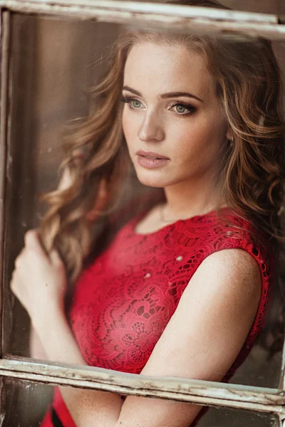 Portrait of red-haired girl with a wreath of red berries on the head — Stock Photo, Image