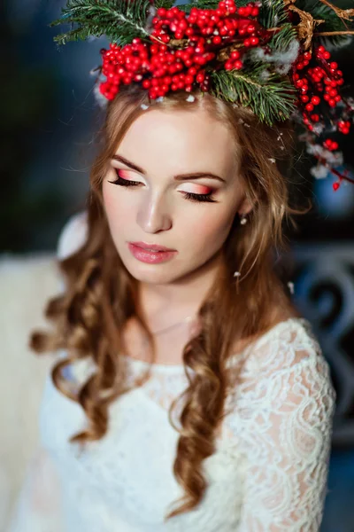 Portrait of red-haired girl with a wreath of red berries on the head — Stock Photo, Image