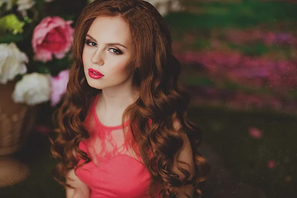 Portrait of sensual redhead young girl on floral background — Stock Photo, Image