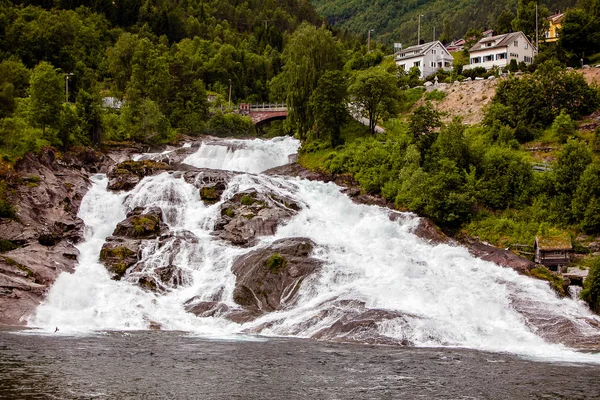 Beautiful large waterfall in Norway in cloudy weather — Stock Photo, Image