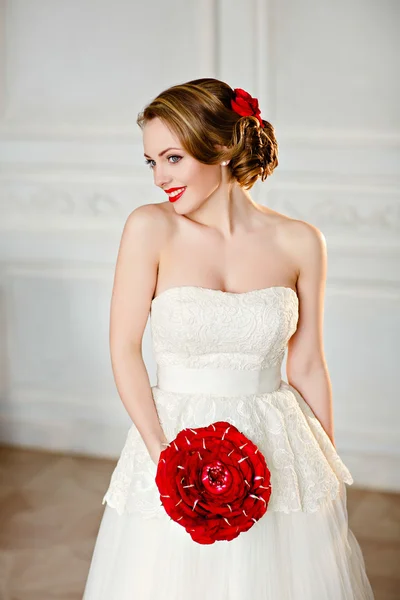 Charming blonde girl with beautiful smile in a white lace dress — ストック写真