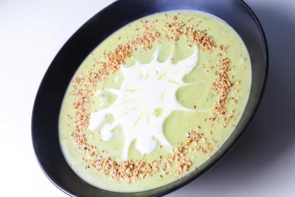 Broccoli cream soup with sesame seed. — Stock Photo, Image