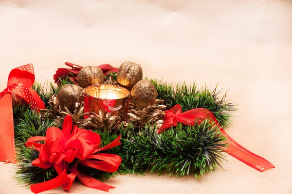 Christmas wreath with lit up candle. — Stock Photo, Image