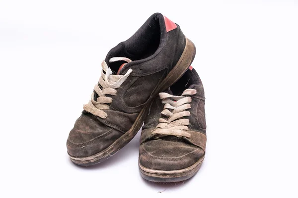 Old rugged shoes isolated. — Stock Photo, Image