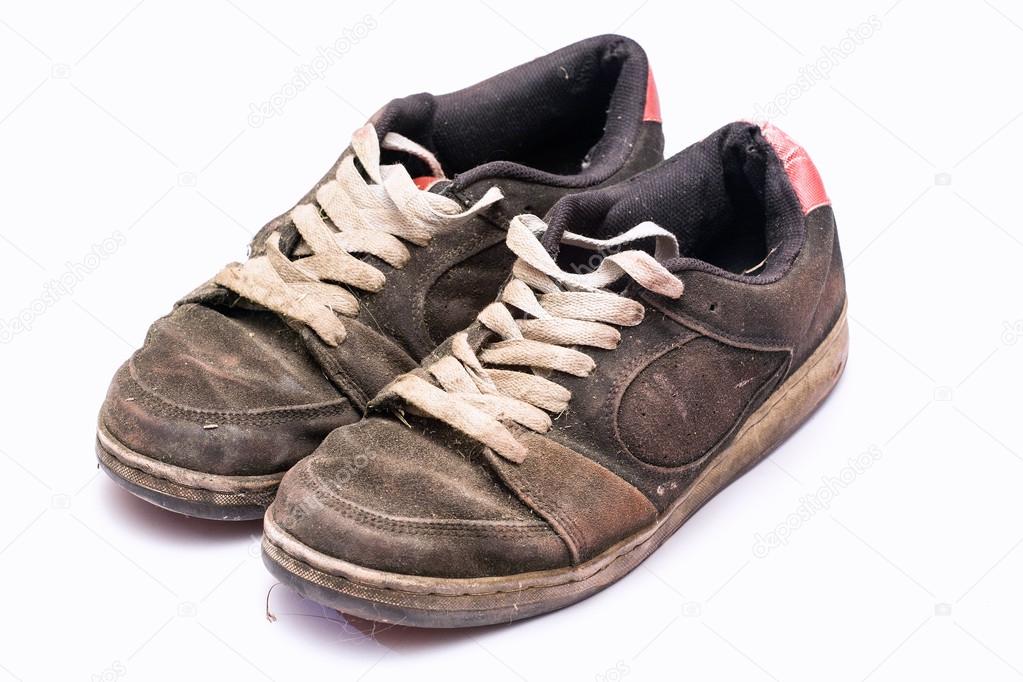 Old rugged shoe isolated.