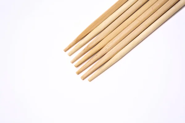 Palillos de madera sobre fondo blanco. —  Fotos de Stock