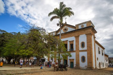 Tourists around main catedral of Paraty city clipart