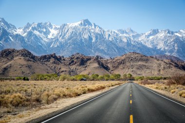Road to beautiful mountains clipart