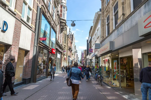 stock image Locals and tourists walking in downtown street 