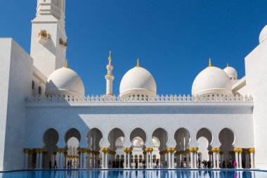 Tourists visiting amazing Grand Mosque clipart