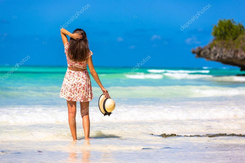 Woman enjoying beautiful beach