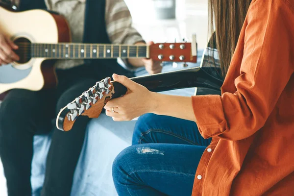 Learning to play the guitar