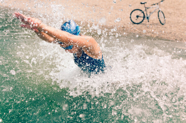 Female triathlete in training