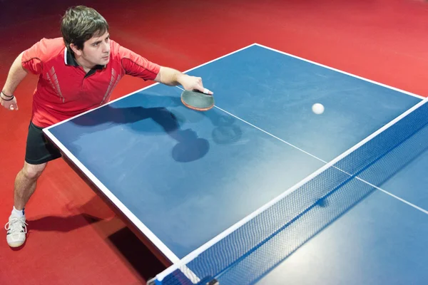 Table tennis player in action — Stock Photo, Image