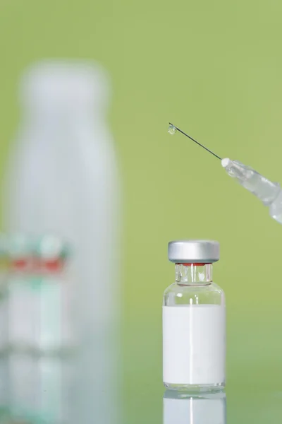 Vaccine vials set and syringe — Stock Photo, Image