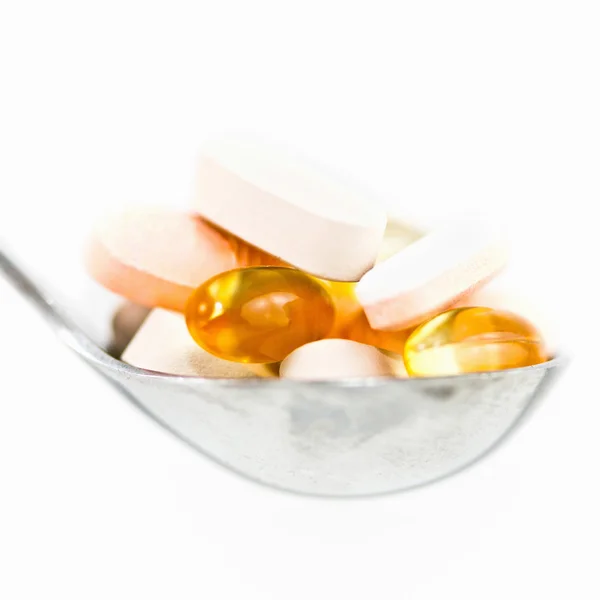 Spoonful of nutritional supplements — Stock Photo, Image