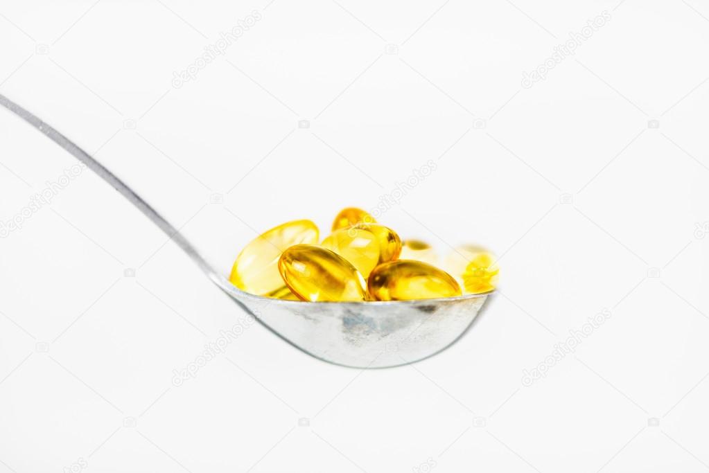 Yellow vitamin E softgels