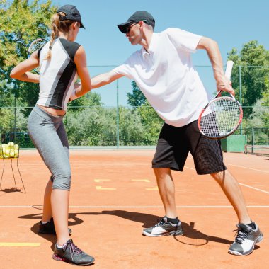 Tennis instructor with student clipart
