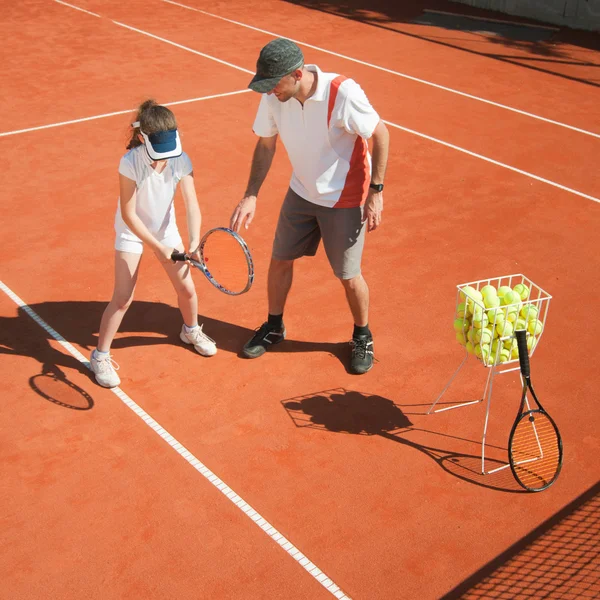 Koç ile Junior tenis oyuncusu — Stok fotoğraf
