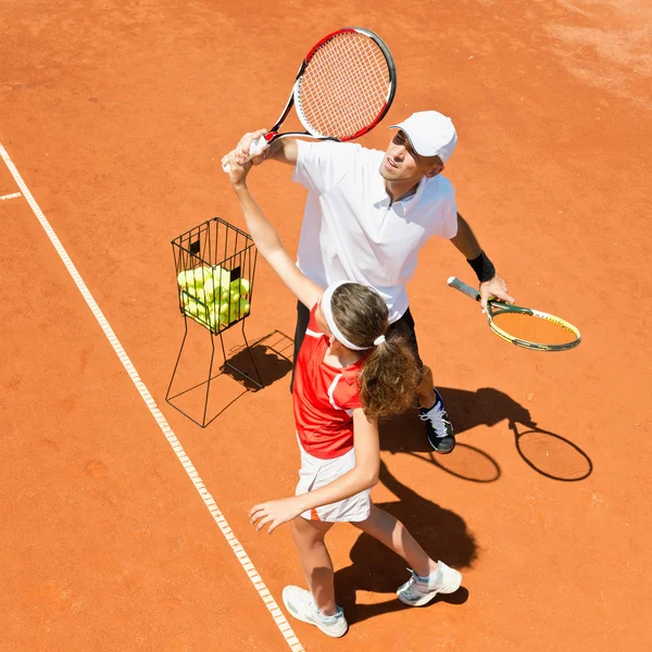 Trainerin und Tennisspielerin — Stockfoto