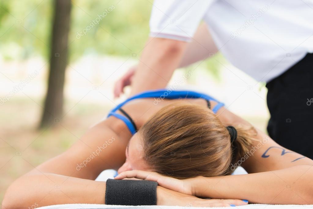 Female athlete on massage table