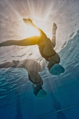 Synchronized swimming women duet clipart