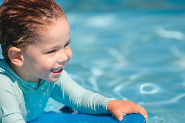 Little boy with swimboard — Stock Photo, Image