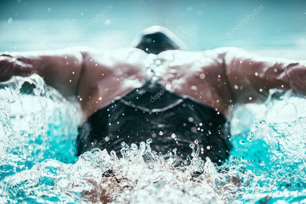 Female athlete swimming in pool