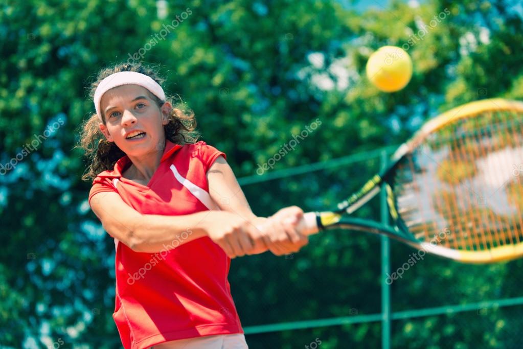 Junior tennis player — Stock Photo © microgen 115182086