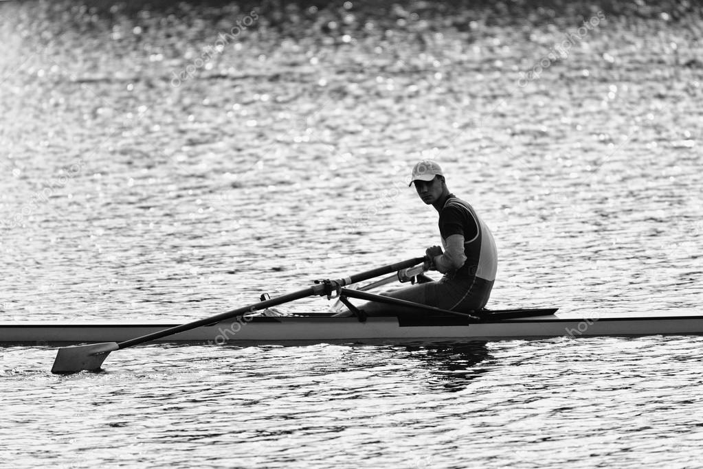 Sportsman resting after rowing