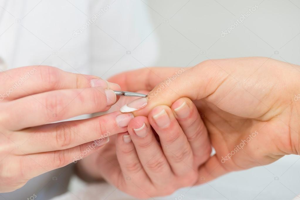 removing cuticle procedure — Stock Photo © microgen 115191302