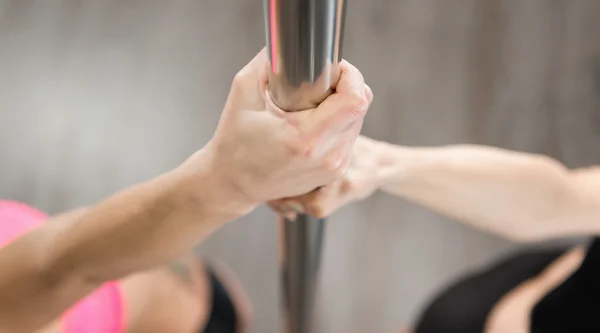 Hands on dancing pole