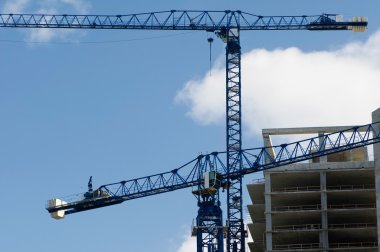 Construction crane over sky clipart