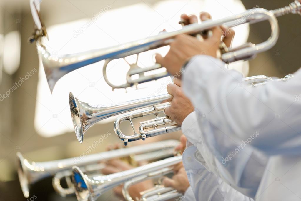  Trumpet players with musical instruments