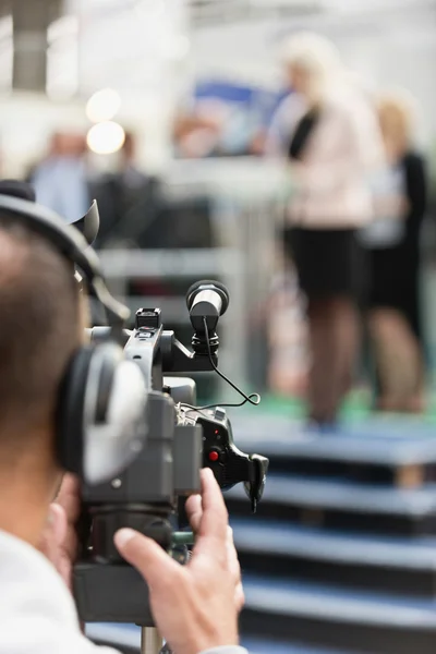 Kameramannen inspelning presskonferens — Stockfoto