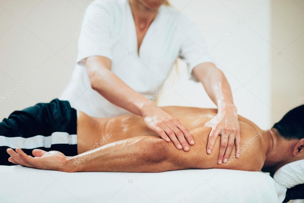 Physical therapist doing massage of arms