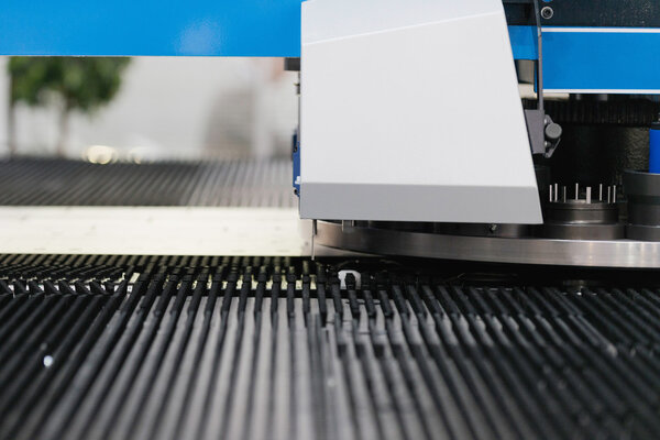 Tin punching machine