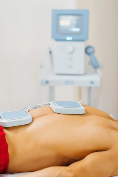 Magnets placed to patient back — Stock Photo, Image