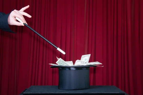 Magician uses magic wand — Stock Photo, Image