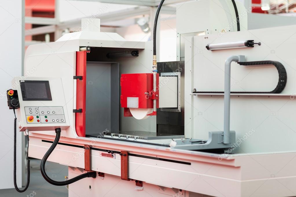 Industrial grinding machine Stock Photo by ©microgen 115472390