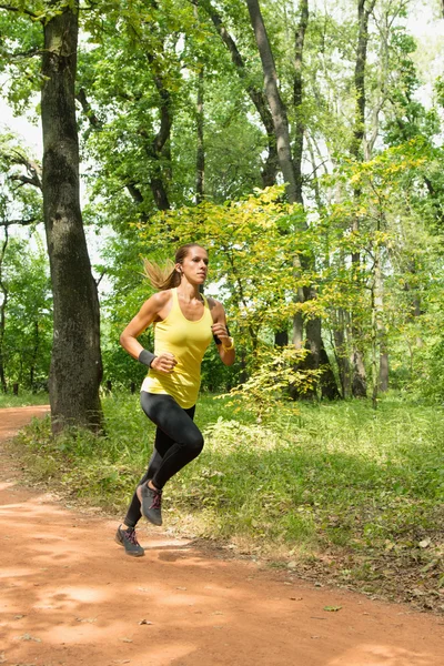 Giovane donna Jogging — Foto Stock