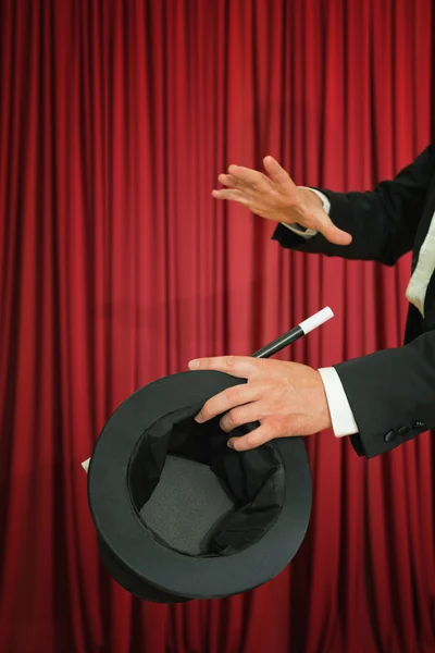 Trick with top hat and magic wand — Stock Photo, Image