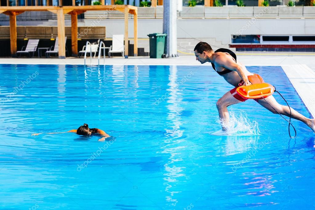 Lifeguard rescue training Stock Photo by ©microgen 115617432