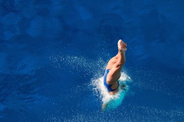 diving competitor enters water clipart