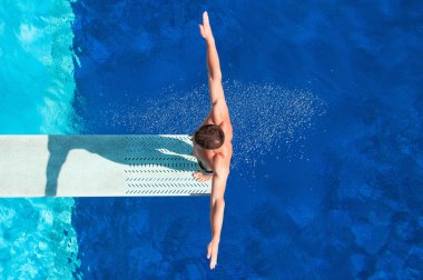 Springboard diving competitor before dive clipart